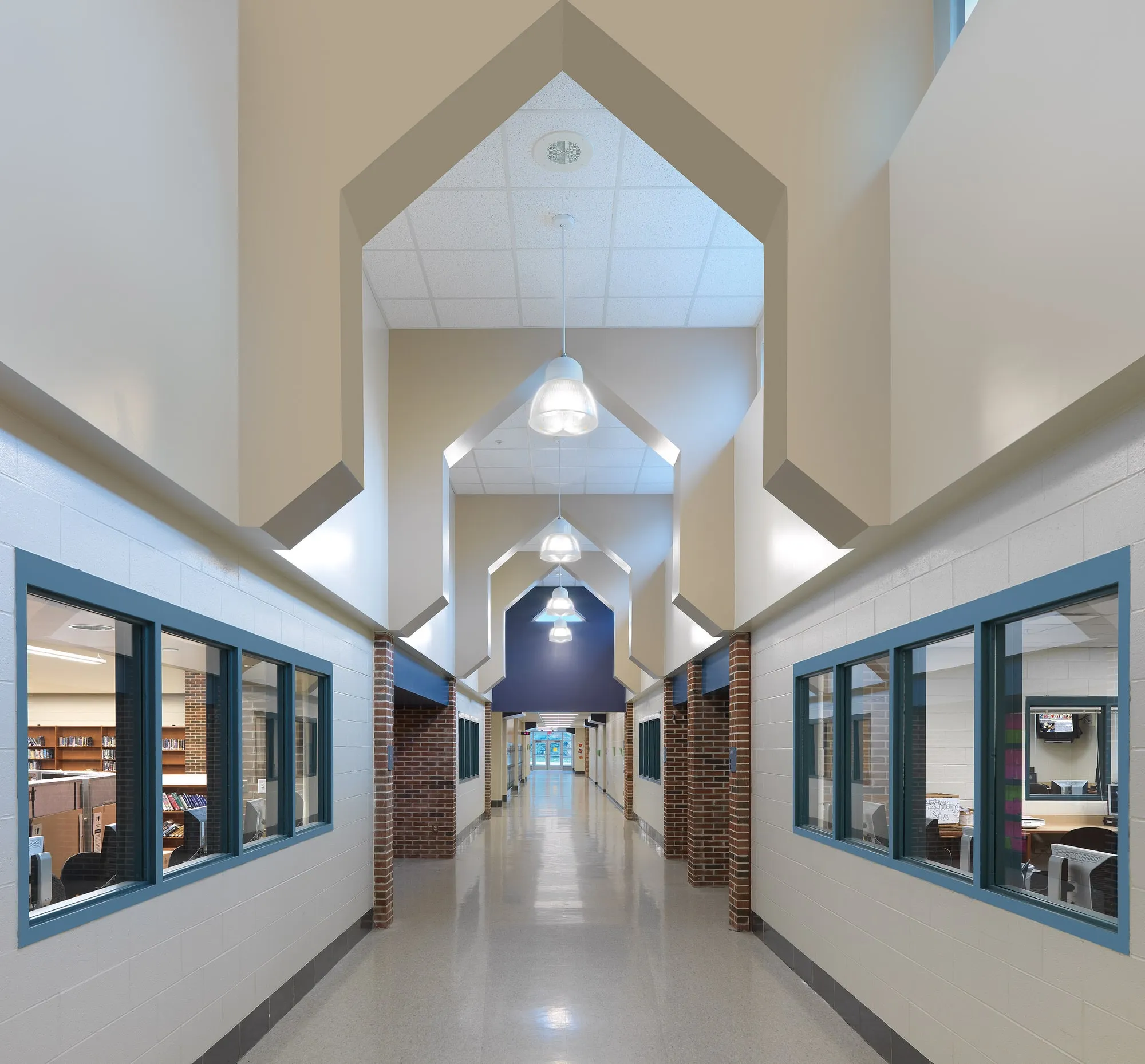 Renovated corridor with gabled ceiling forms