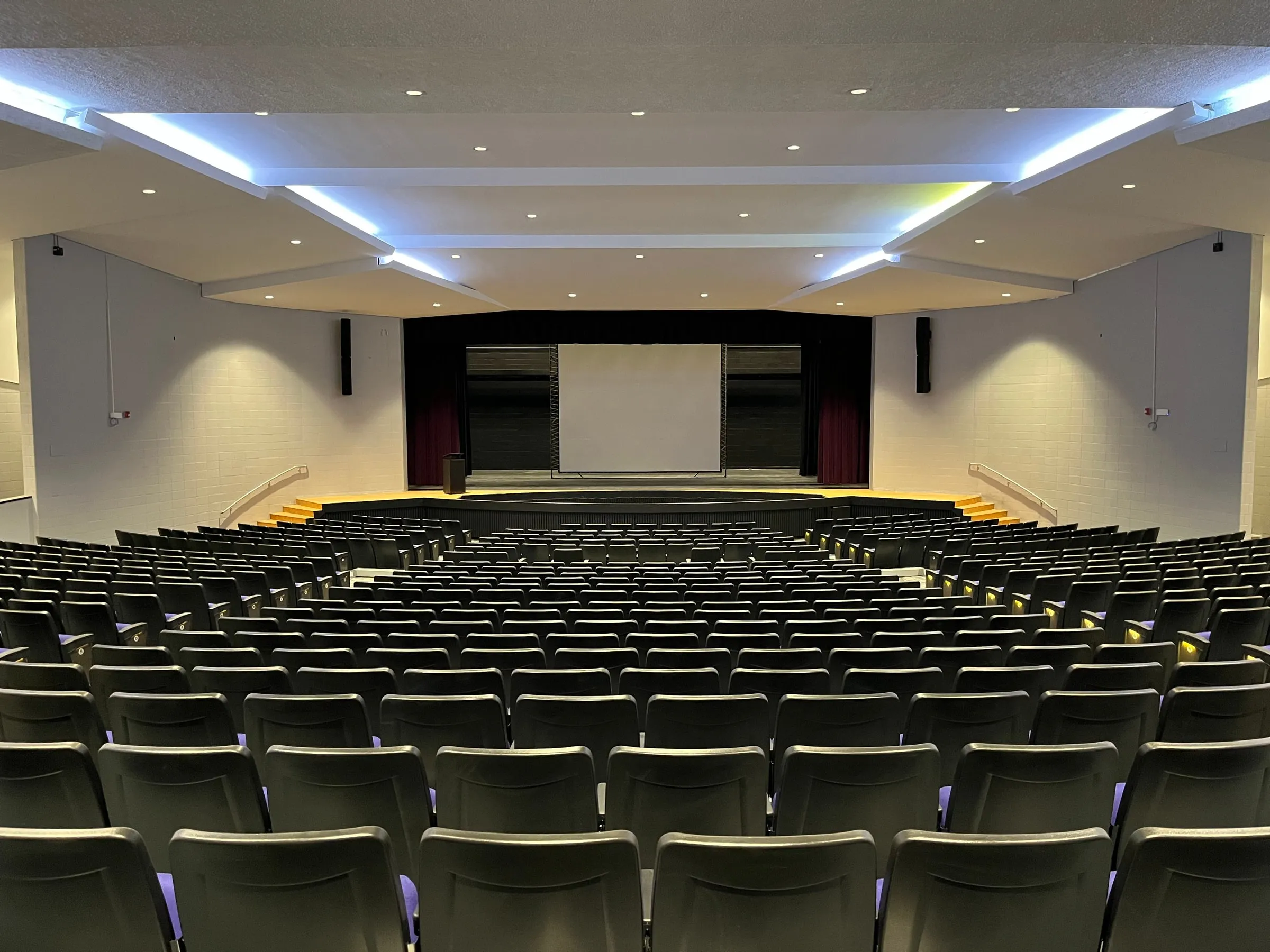 Renovated Pontiac High School auditorium with new seating and lighting