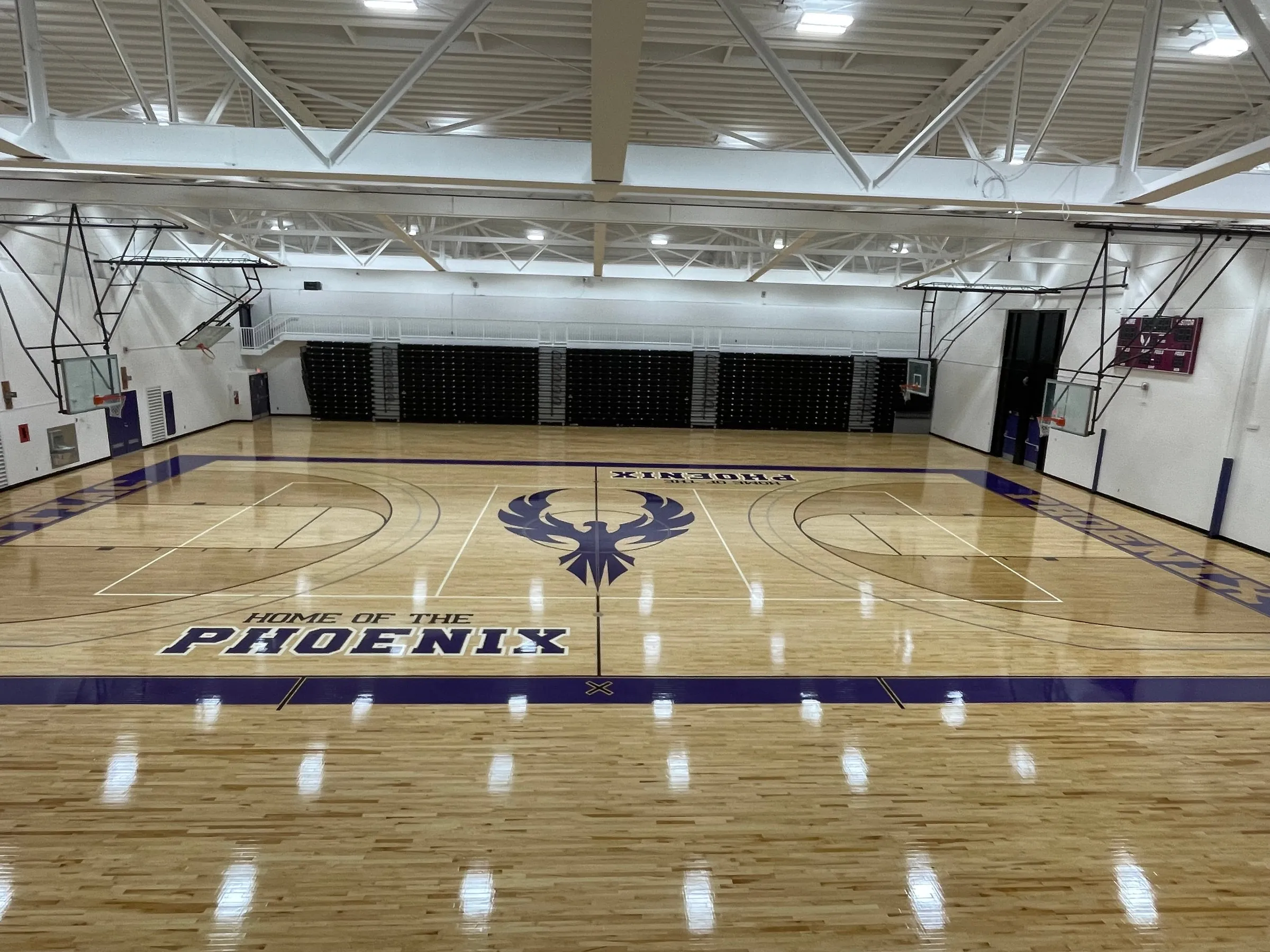 Refinished Pontiac High School gym floor with the Phoenix logo