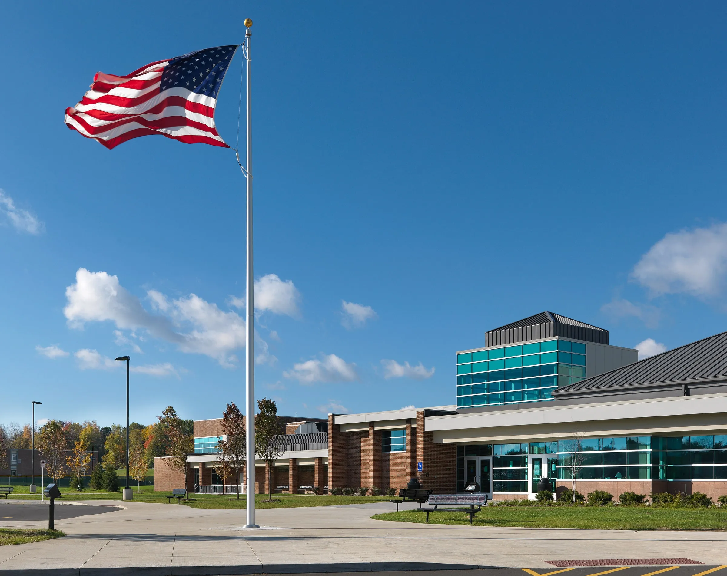 Van Hoosen Middle School wide entrance elevation with flag